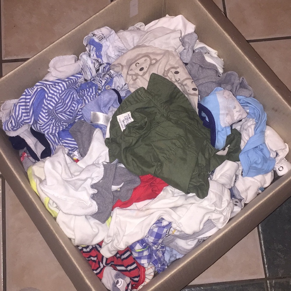 box of baby boy clothes from newborn to 6 months